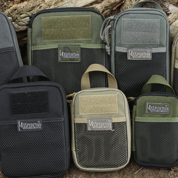 A variety of Pocket Organizers in rows of 2, showing off different sizes and colors.